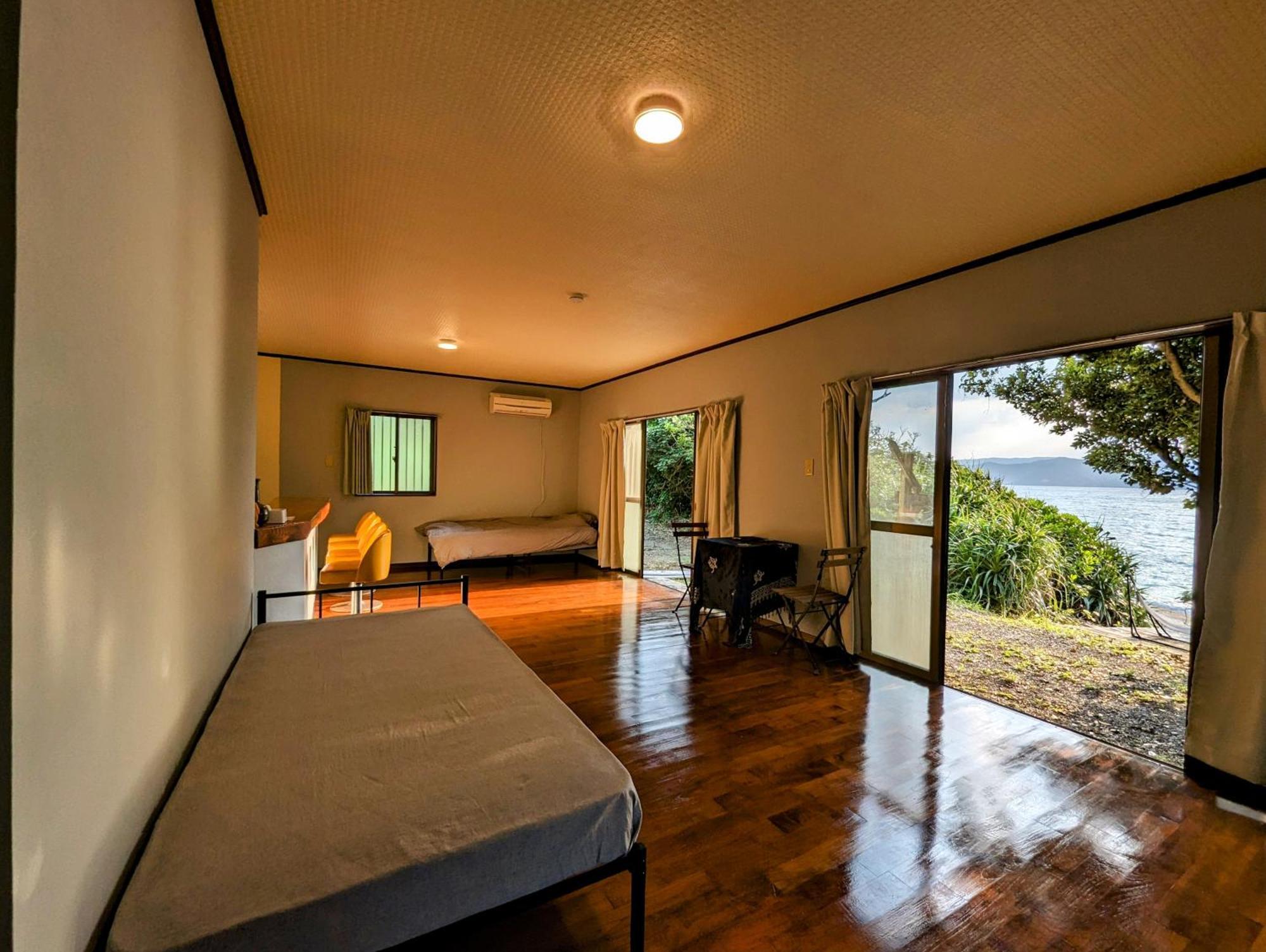 Villa くじらの家 Amami Esterno foto